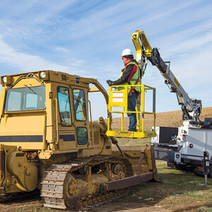 PALFINGER Service Crane equipped with personnel basket