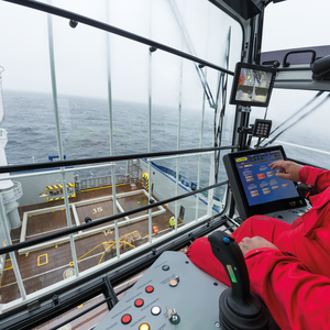 Crane operator in operator cabin
