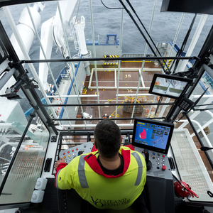 Crane operator in operator cabin