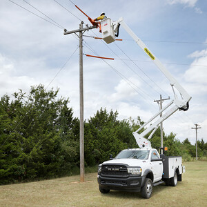 ETC 40 IH Front View Extended with Man in Bucket