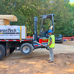 Off-loading truck-mounted forklift