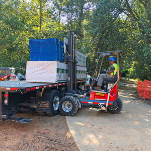 Truck-Mounted Forklift Unloading of Roofing Materials