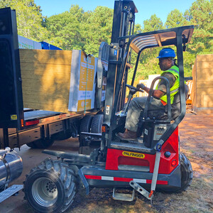 Truck-Mounted Forklift Unloading of Roofing Materials