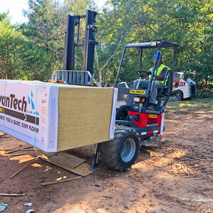 Truck-Mounted Forklift Delivery of Roofing Materials