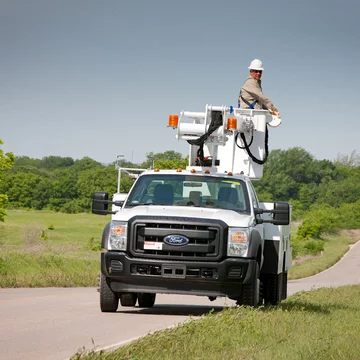 ETC 35 SNT Man on Side of Road In Bucket