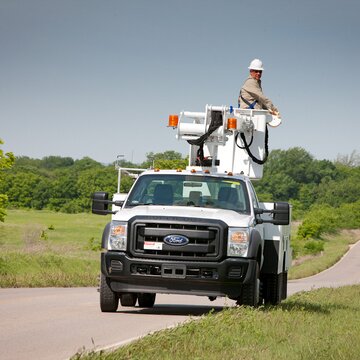 ETC 35 SNT Man on Side of Road In Bucket