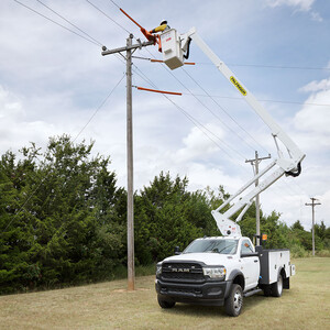 ETC 40 IH Front View Extended with Man in Bucket