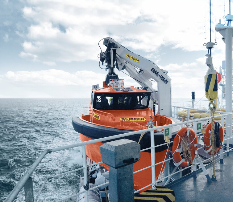 An orange PALFINGER MARINE rescueboat is shown.