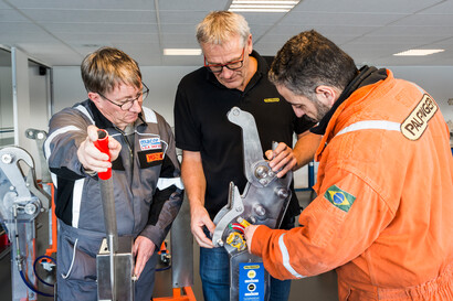 Service engineers and training instructor during training